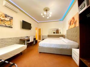 Postel nebo postele na pokoji v ubytování Hotel Ester