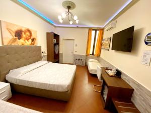 Postel nebo postele na pokoji v ubytování Hotel Ester