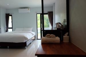 Gallery image of De Vine House in Roi Et