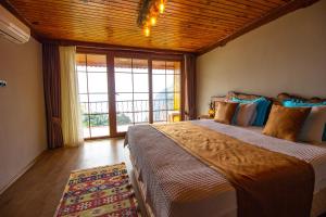 Кровать или кровати в номере Keyif Motel