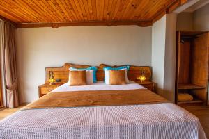 Postel nebo postele na pokoji v ubytování Keyif Motel