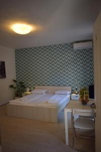 Cama o camas de una habitación en Apartments Pia