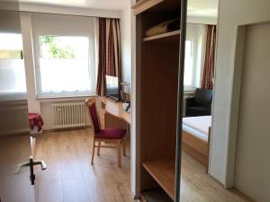 Postel nebo postele na pokoji v ubytování Hotel Haus am Rieth