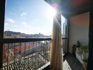 uma varanda com vista para a cidade em Centro Sicilia Rooms-Suites & Terrace em Enna