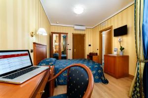 TV a/nebo společenská místnost v ubytování Hotel Hermitage