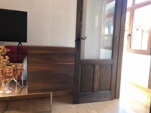 TV a/nebo společenská místnost v ubytování La Capilla del Corral