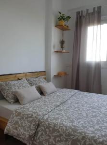 Postel nebo postele na pokoji v ubytování sobe Divna
