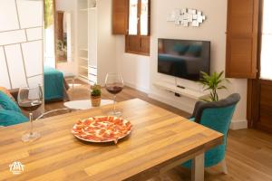 A television and/or entertainment centre at AiA LOFT BIBRAMBLA