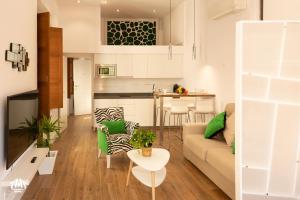A kitchen or kitchenette at AiA LOFT BIBRAMBLA