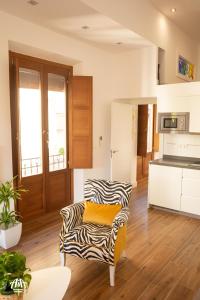 A kitchen or kitchenette at AiA LOFT BIBRAMBLA
