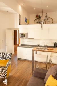 A kitchen or kitchenette at AiA LOFT BIBRAMBLA