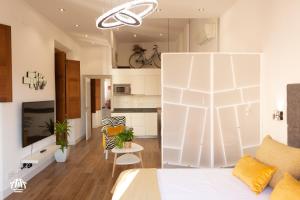 A kitchen or kitchenette at AiA LOFT BIBRAMBLA