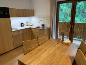 Kuchyň nebo kuchyňský kout v ubytování YASNA Apartments