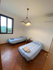 En eller flere senger på et rom på Il Villino