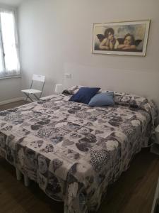 Postel nebo postele na pokoji v ubytování Pontassieve Guest house Centro Storico Appartamento 20 minuti da Firenze