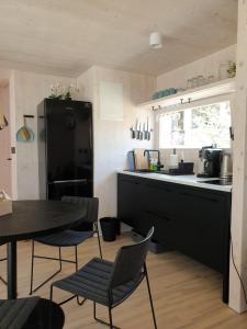 Kuchyňa alebo kuchynka v ubytovaní Eco Resort Buqez villa 34
