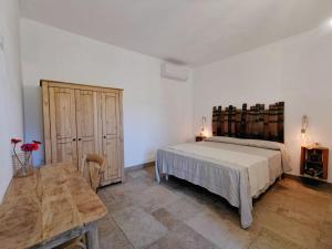 Agriturismo Casa Ricci客房内的一张或多张床位