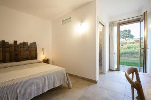 Agriturismo Casa Ricci客房内的一张或多张床位