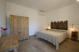 Agriturismo Casa Ricci客房内的一张或多张床位
