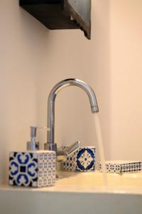 MandrakiaにあるAegean Blue Housesの水の流し台