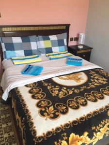 Uma cama ou camas num quarto em TanjaLucia Hostel