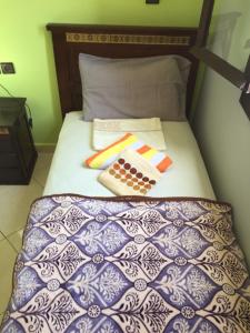 Uma cama ou camas num quarto em TanjaLucia Hostel