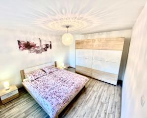 Postel nebo postele na pokoji v ubytování Guesthouse L&K