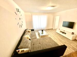 TV a/nebo společenská místnost v ubytování Guesthouse L&K