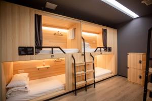 Postel nebo postele na pokoji v ubytování Xi'an Desti Youth Park Hostel Bell & Drum Tower