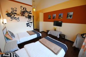 Postel nebo postele na pokoji v ubytování Maple Leaf Inn