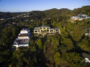 an aerial view of houses on a mountain at Allegra House in Paihia