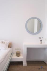A bed or beds in a room at Cavo Milos