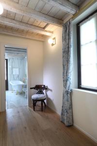 Postel nebo postele na pokoji v ubytování Suites&Atelier Lake Como