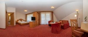 TV a/nebo společenská místnost v ubytování Hotel Garni Elisabeth