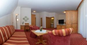 TV a/nebo společenská místnost v ubytování Hotel Garni Elisabeth