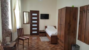 Кровать или кровати в номере Hotel Grazhina