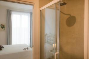 Kúpeľňa v ubytovaní Residenza Lago + 37 fotografií