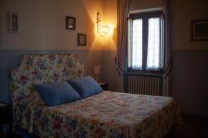 En eller flere senge i et værelse på Casa vacanze Casalsole