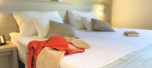 Ein Bett oder Betten in einem Zimmer der Unterkunft DIEHOLIDAYBUCHT