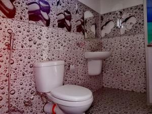 Koupelna v ubytování Sandew Residence + 37 fotografií