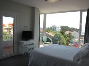 Posteľ alebo postele v izbe v ubytovaní Hotel Ton