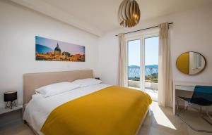 Postel nebo postele na pokoji v ubytování House Maro + 35 fotografií