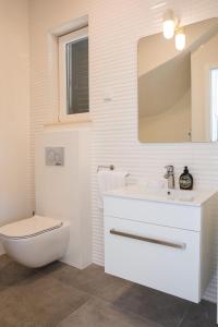 Koupelna v ubytování House Maro
