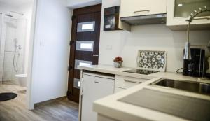 Kuchyňa alebo kuchynka v ubytovaní Modern getaway Studio for two