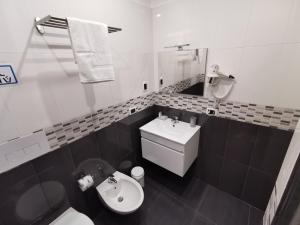 Koupelna v ubytování Soave Rooms