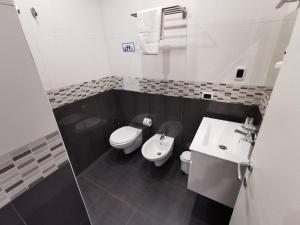 Koupelna v ubytování Soave Rooms
