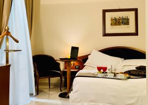 Posteľ alebo postele v izbe v ubytovaní Massimo Plaza Hotel