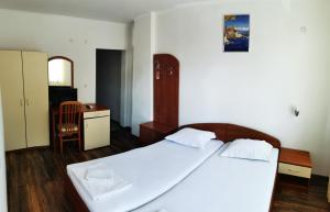 A bed or beds in a room at Villa Diana Self check-in