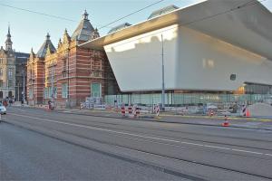 a large white building on the side of a street at The Little Townhouse in Amsterdam +4 photos