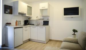 Kuchyňa alebo kuchynka v ubytovaní Modern getaway Studio for two